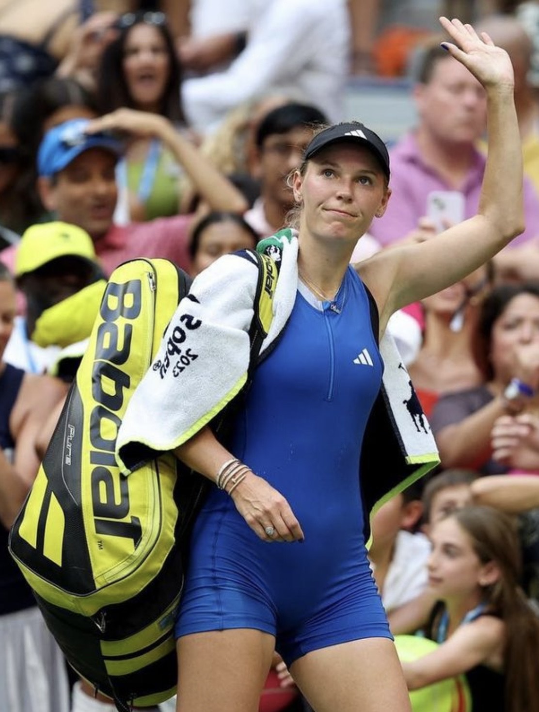 Caroline Wozniacki waving to the crowd after a match at the US Open.
